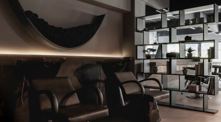 Stylish interior of Anchor Lab, a modern beauty venue in London, England with chic seating and décor.