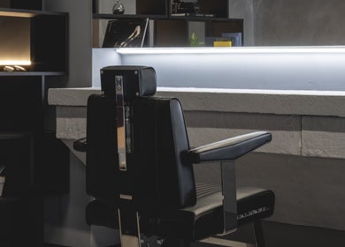 Modern barber chair at Anchor Lab in London, England, GB provides stylish grooming service.