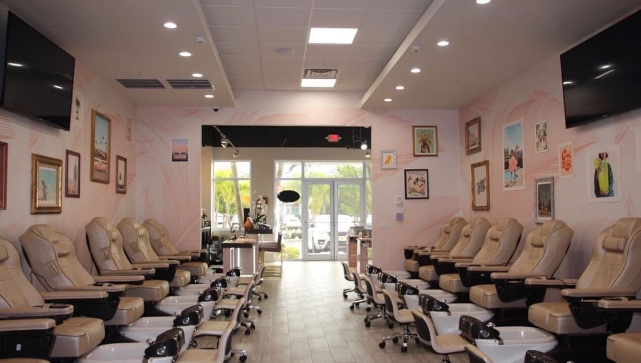 Luxurious pedicure chairs at Selfie Salonbar in Palm Beach Gardens, Florida, US with stylish decor.