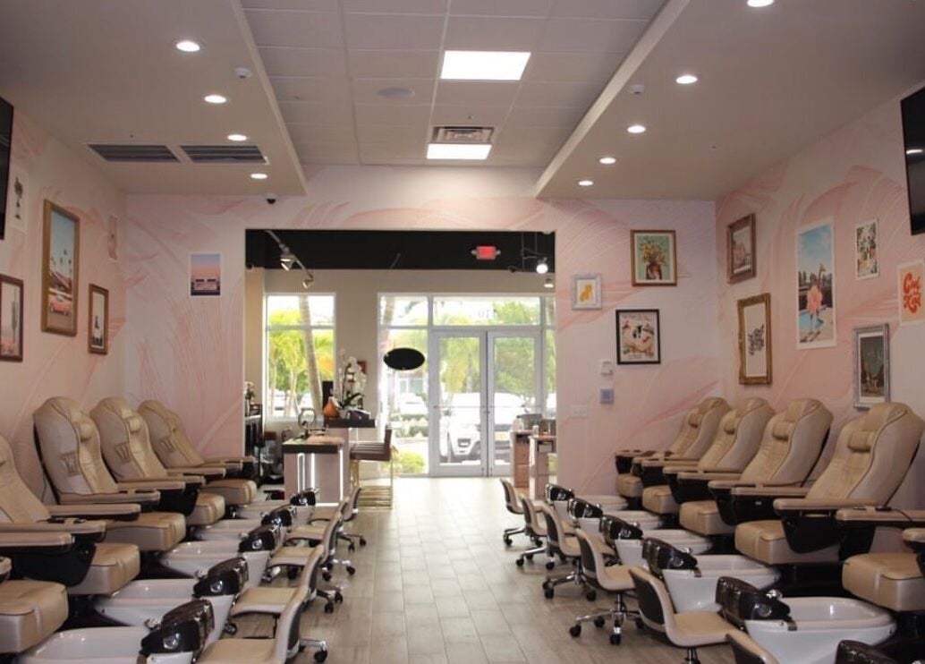 Luxurious pedicure chairs at Selfie Salonbar in Palm Beach Gardens, Florida, US with stylish decor.