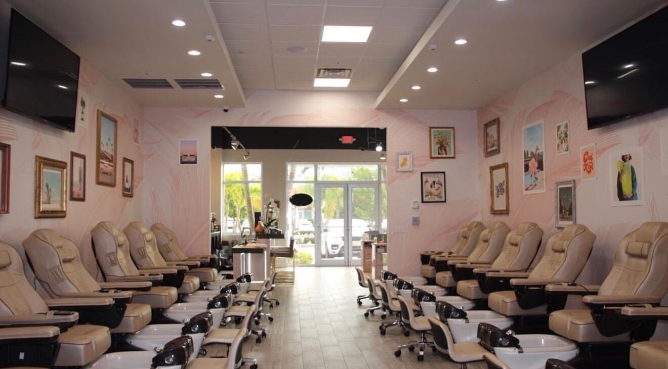 Luxurious pedicure chairs at Selfie Salonbar in Palm Beach Gardens, Florida, US with stylish decor.