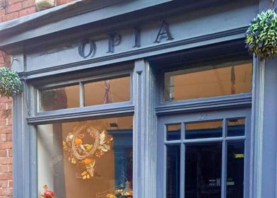 Front view of Jazz at Opia Hair and Beauty, Leek, England, GB with vibrant decor.