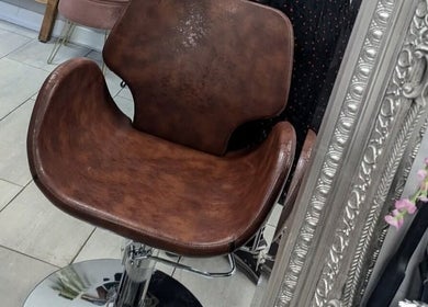 Elegant vintage chair at Jazz at Opia Hair and Beauty, Leek, England, GB.