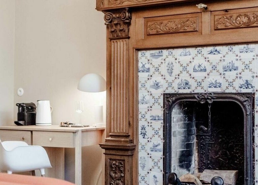 Charming interior with antique fireplace at Sanctum Spa, Maastricht, Limburg, NL.