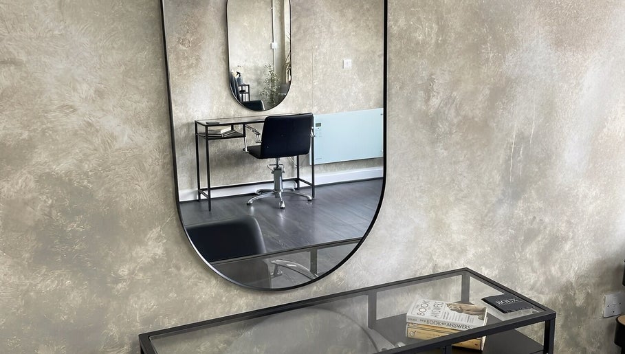 Modern beauty salon at Roux - Jessica in Irlam, England, GB, featuring elegant decor and stylish furnishings.