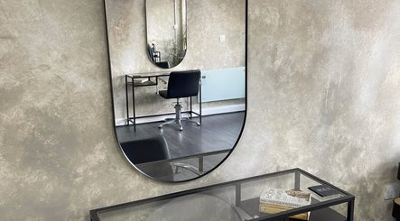 Modern beauty salon at Roux - Jessica in Irlam, England, GB, featuring elegant decor and stylish furnishings.