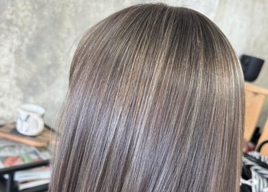 Sleek, glossy brown hair styled at Roux - Jessica, Irlam, England, GB, showcasing expert salon finish.