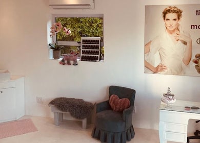 Cozy interior of The Nail Room in Cape Town, Western Cape, ZA, featuring chic decor and a serene ambiance.