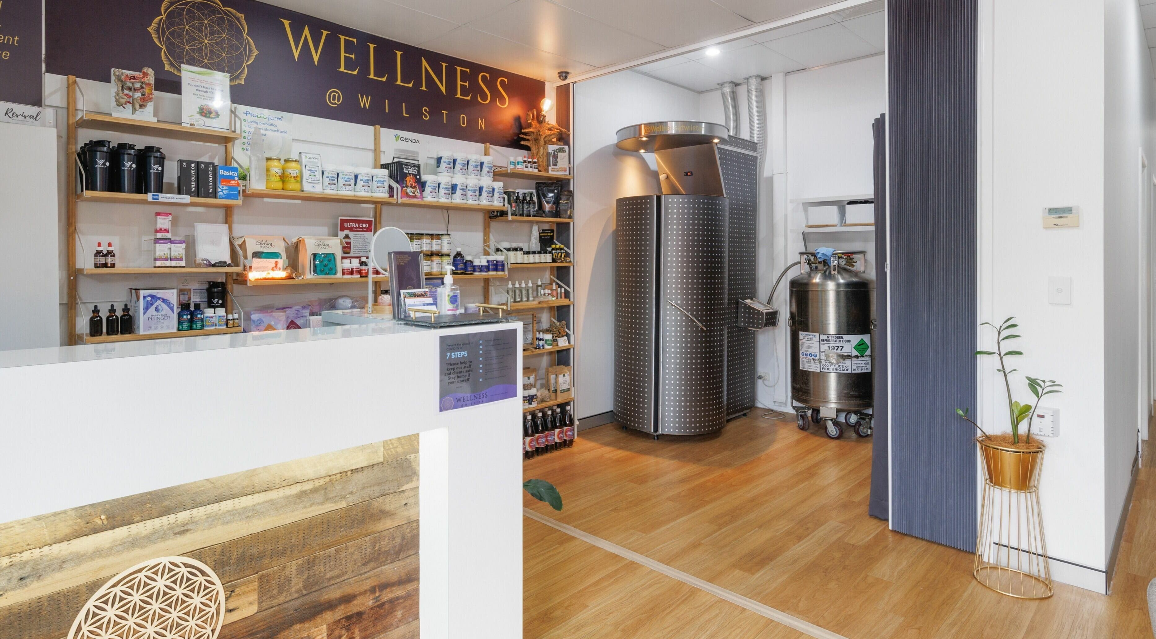 Reception and cryotherapy area at Wellness at Wilston, Wilston, QLD, AU. Modern design and wellness products displayed.