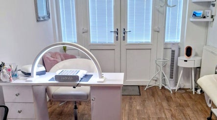 Modern nail station at Just Beauty by Zoe, Houghton le Spring, England, GB, with elegant decor and tools.