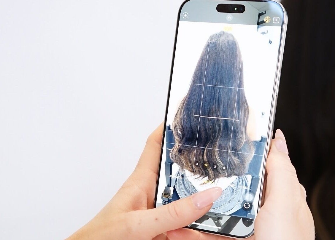 Capturing a stunning hairstyle at THE BOUTIQUE by MLR in Barry, Wales, GB using a smartphone.