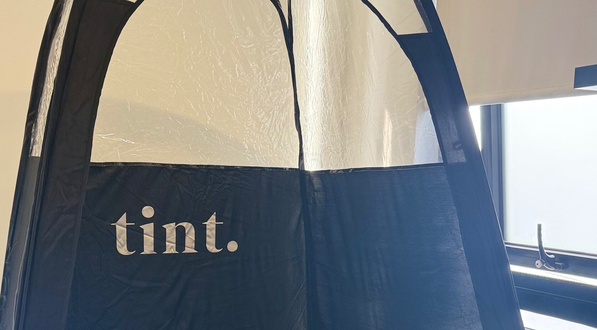 Tinted spray tan booth at The Spray Tan Club, Barry, Wales, GB offering professional tanning services.