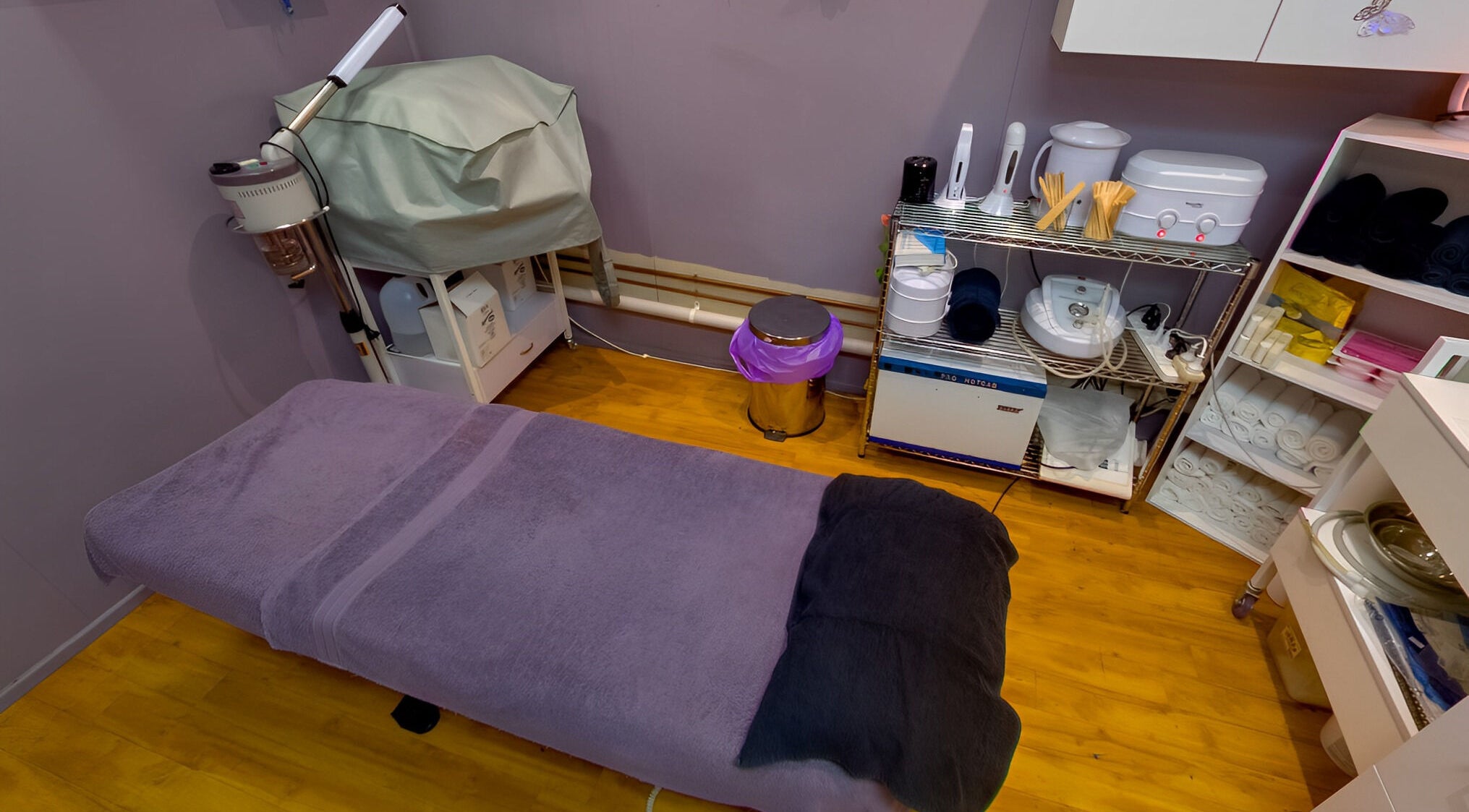 Cozy treatment room at Soul Studio Beauty, Gatton, Queensland, AU with massage table and skincare equipment.