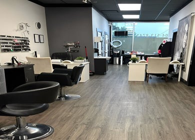 Modern interior of Buhf Beauty Boutique in Langley City, British Columbia, CA showcasing stylish salon seating and decor.