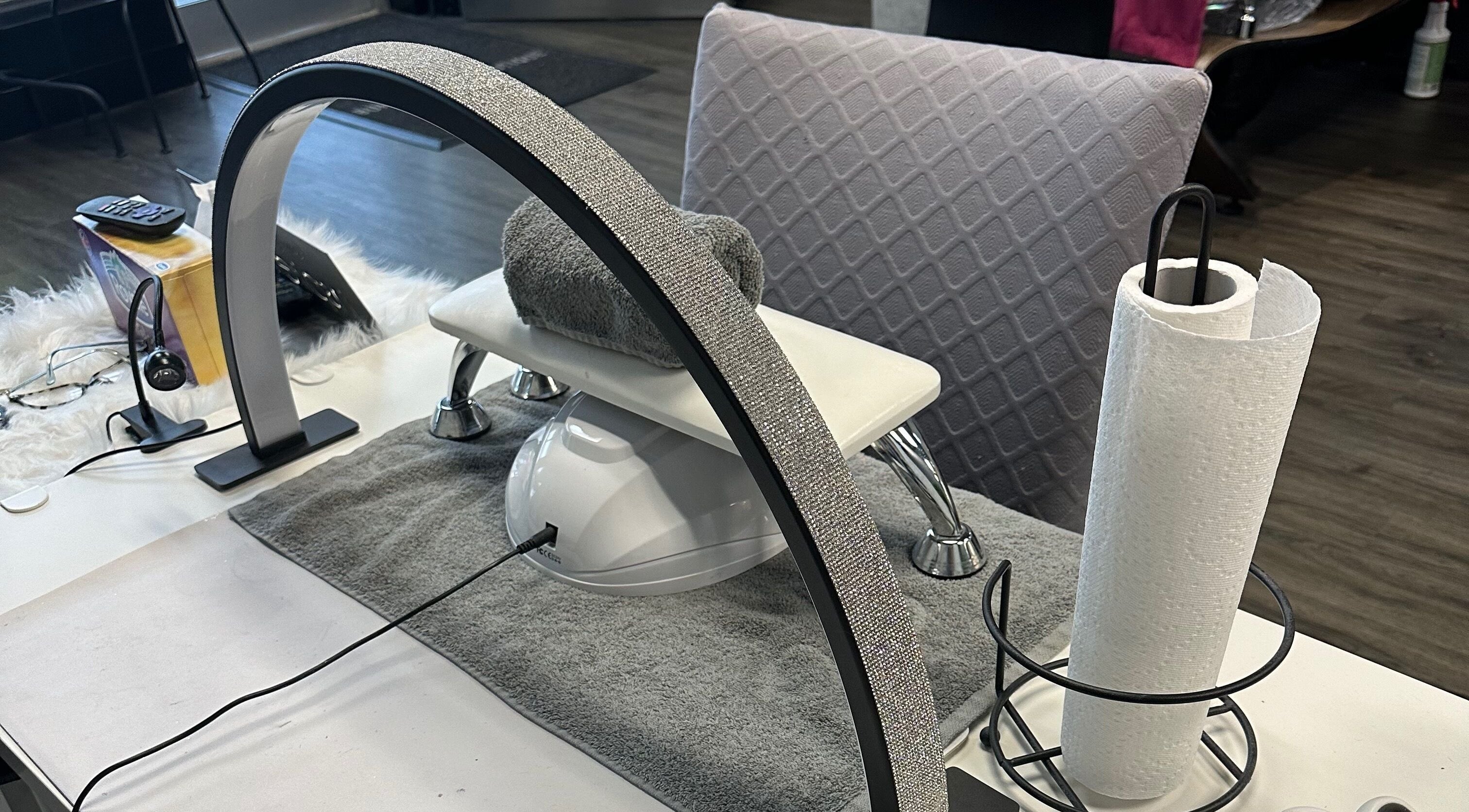 Chic nail station setup at Buhf Beauty Boutique in Langley City, British Columbia, CA featuring modern amenities.