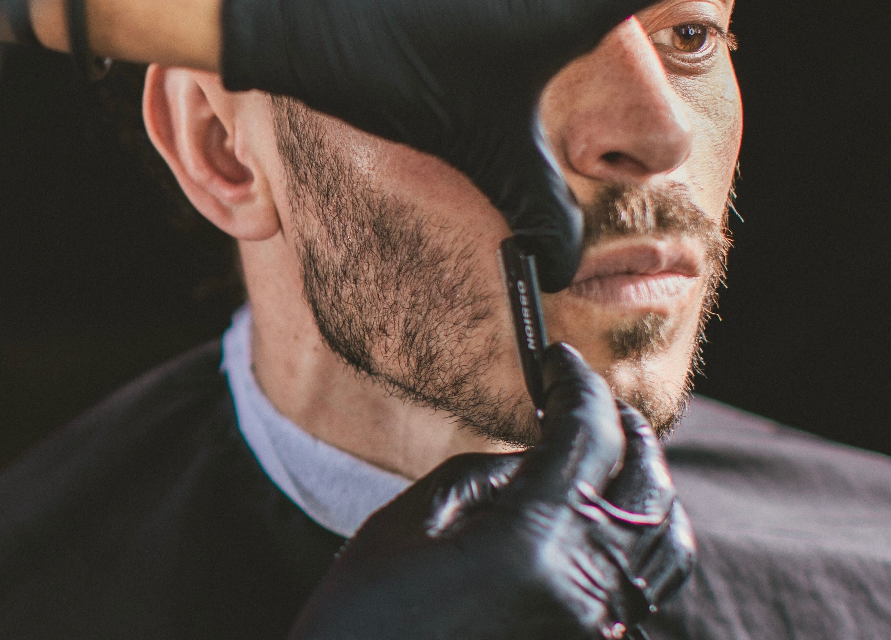 Close-up of a beard trim at Barbería H, Tijuana, Baja California, MX showcasing expert grooming techniques.