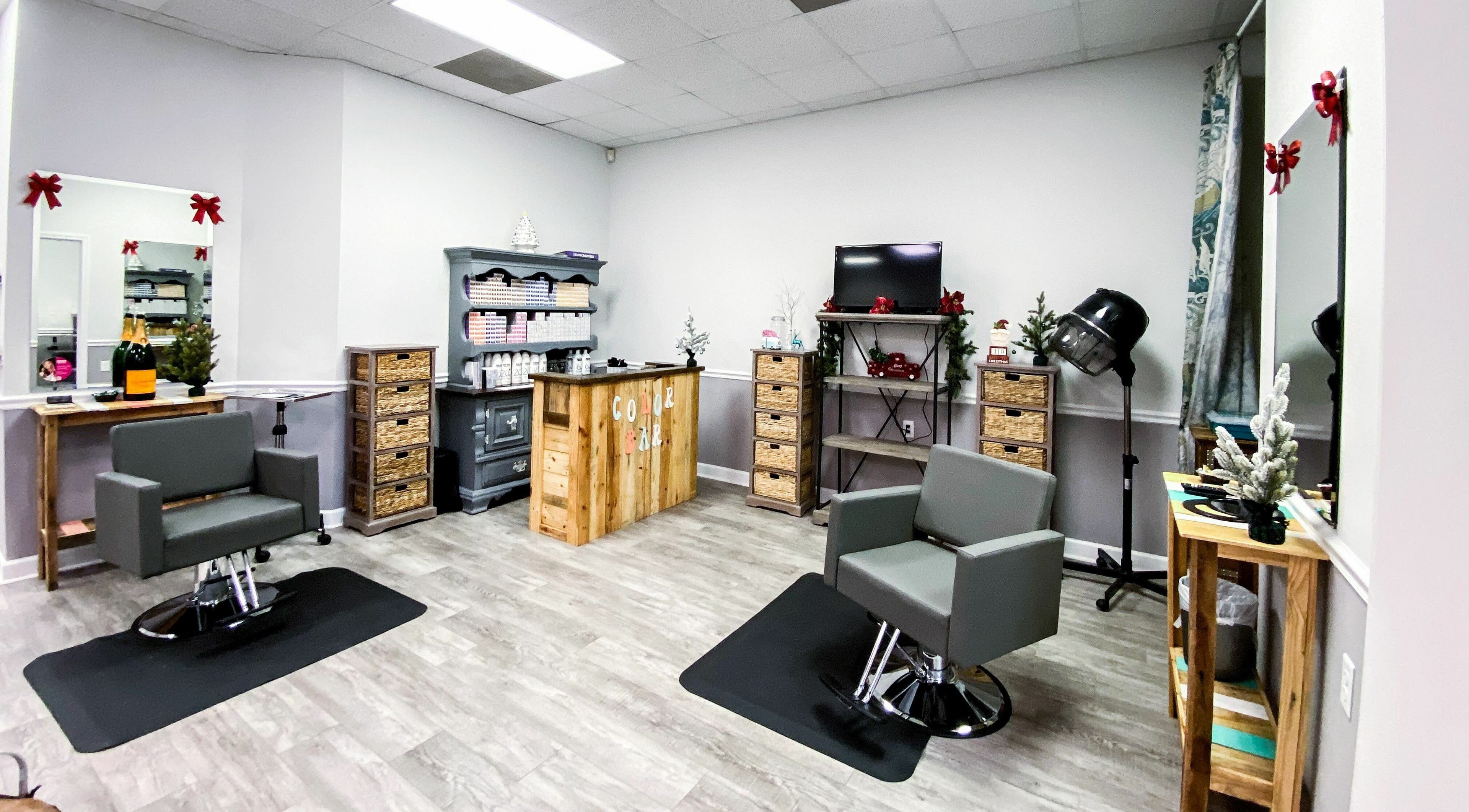 Modern salon interior at Hair Identity, Vero Beach, Florida, US with stylish chairs and decor.