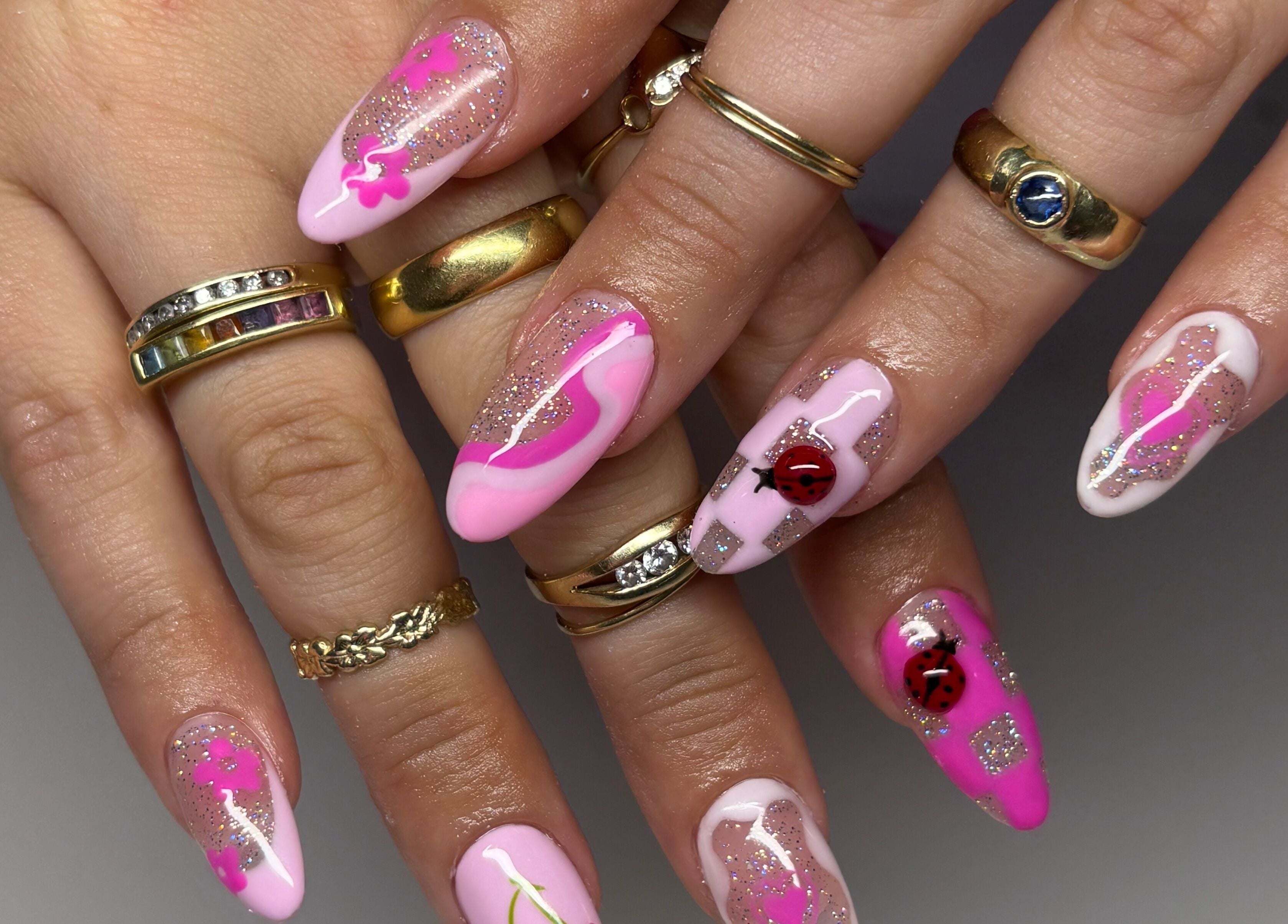 Bright pink artful manicure at Groove Salon, Newtown, New South Wales, AU with sparkling accents.