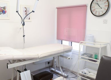 Relaxing treatment room at Crescent Brows, Lambourn, England, GB, featuring a comfortable massage table and serene decor.