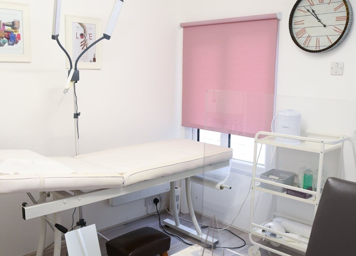 Relaxing treatment room at Crescent Brows, Lambourn, England, GB, featuring a comfortable massage table and serene decor.