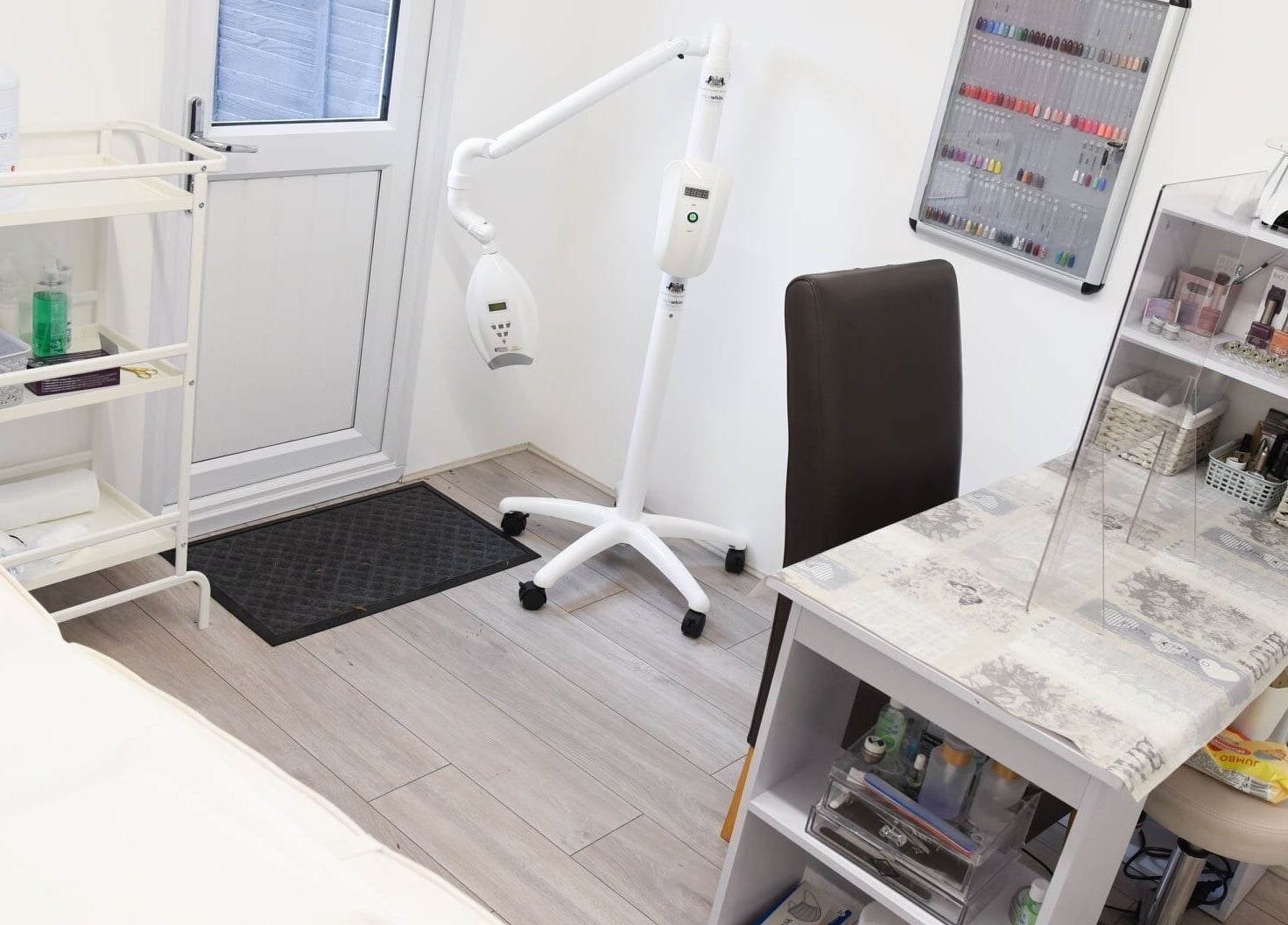 Crescent Brows, Lambourn, England, GB beauty treatment room with manicure table and skincare equipment.