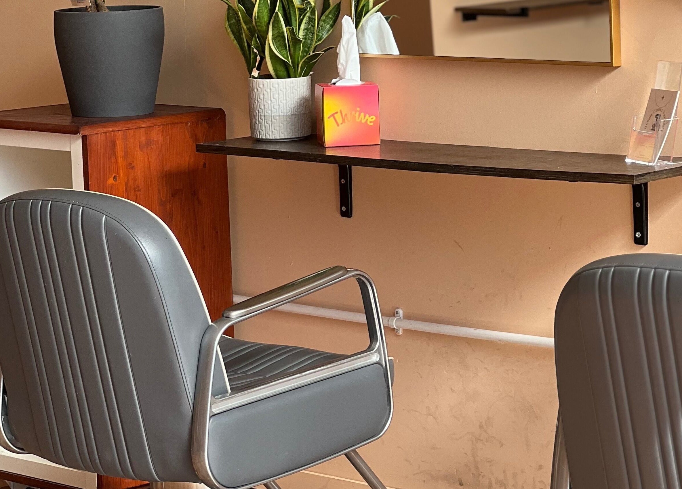 Modern salon chair and mirror setup at Maxine, Southend-on-Sea, England, GB spa for beauty treatments.