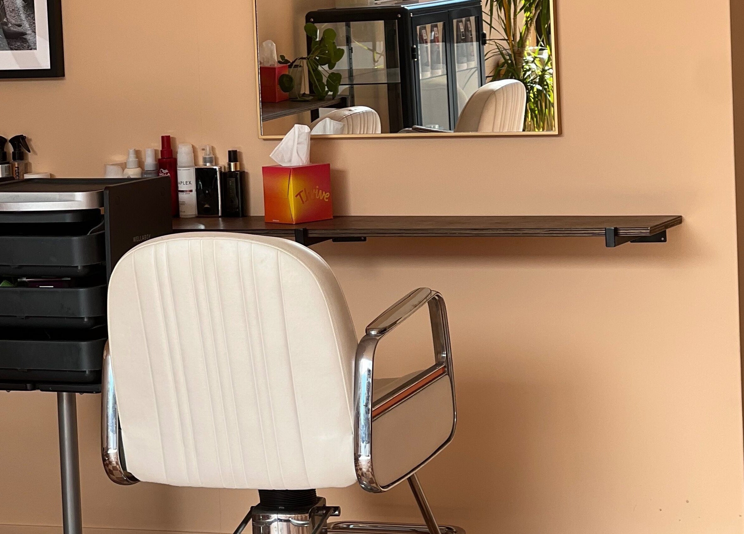 Sleek salon chair at Maxine, Southend-on-Sea, England, GB. A stylish beauty space with modern decor.