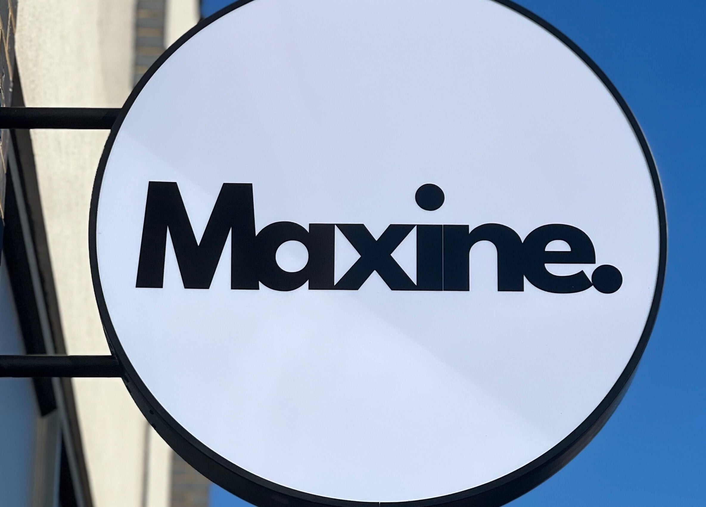 Maxine sign outside venue in Southend-on-Sea, England, GB, showcasing elegant branding and modern style.