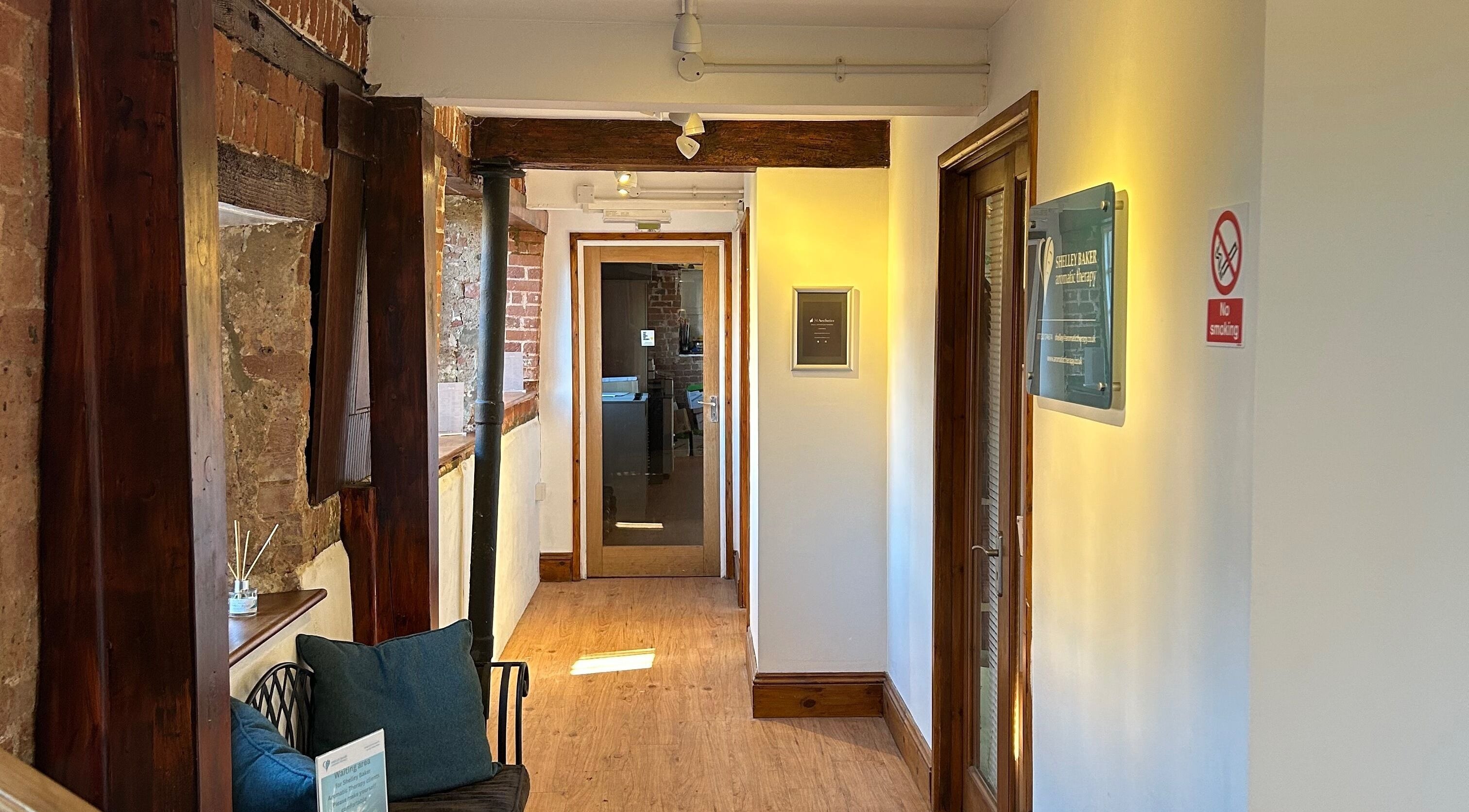 Charming wooden and brick hallway at M Aesthetics - Wilton, Wilton, England, GB.