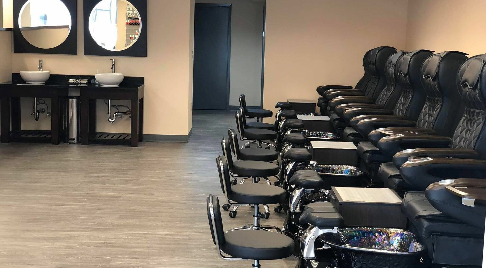 Comfortable salon seating at Orange Nail Studio in Beverly, Massachusetts, US offering top-notch nail services.