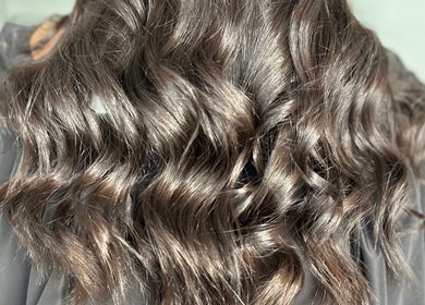 Glossy, wavy hair styled at BW Hair in East Corrimal, New South Wales, AU.