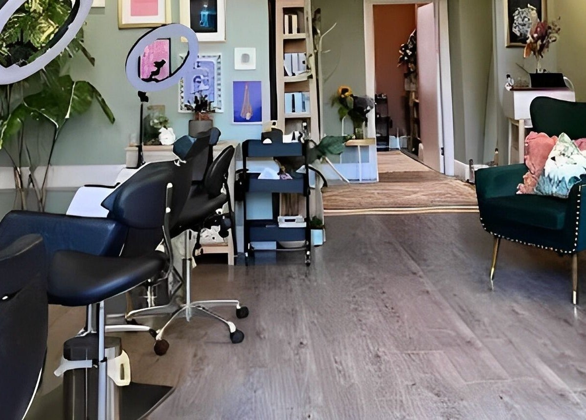 Modern salon interior at Alchemy Lab, Dublin, Dublin, IE showcasing stylish seating and decor.