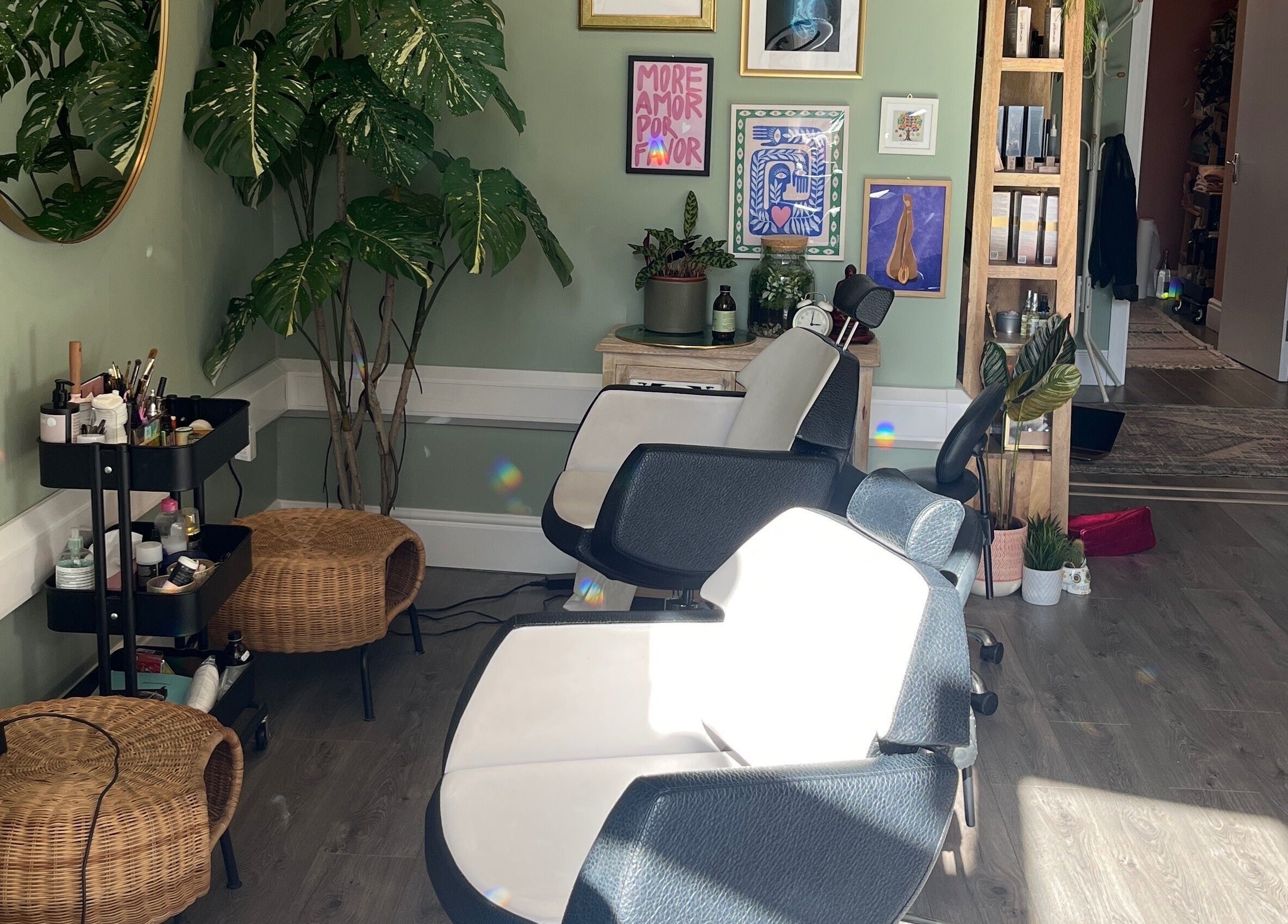 Chic interior of Alchemy Lab with salon chairs, plants, and decor in Dublin, Dublin, IE.