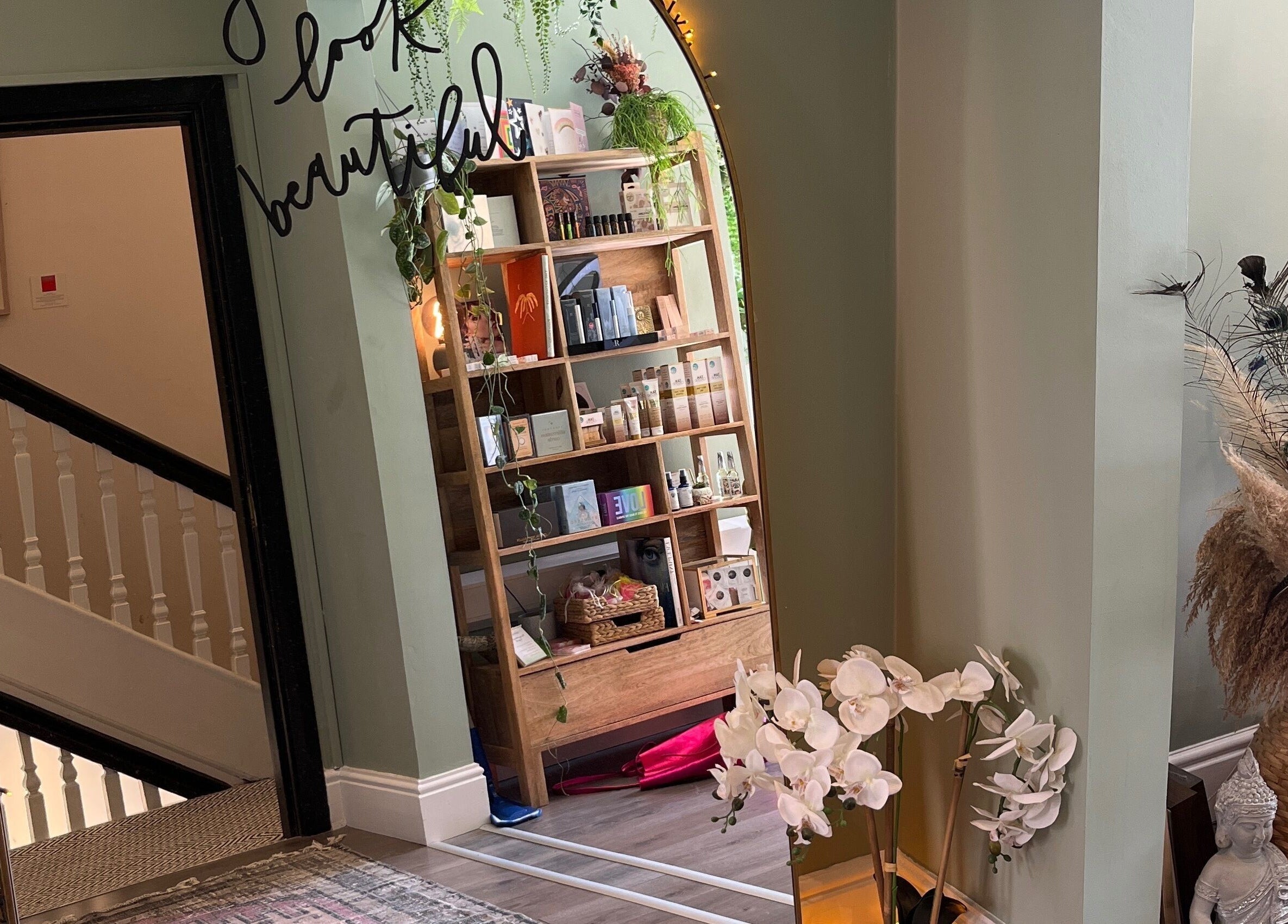 Chic interior of Alchemy Lab, Dublin, Dublin, IE, showcasing a lit mirror and elegant decor.