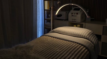 Relaxing treatment room at Koda Beauty Studio in Forrestdale, Western Australia, AU featuring soft lighting.