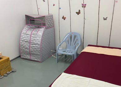 Cozy therapy room at Zie N Ly Spa, Changlun, Kedah, MY, featuring a massage bed and sauna setup.