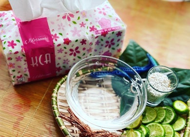 Relaxing spa setup at Zie N Ly Spa in Changlun, Kedah, MY with tissues, limes, and natural elements.