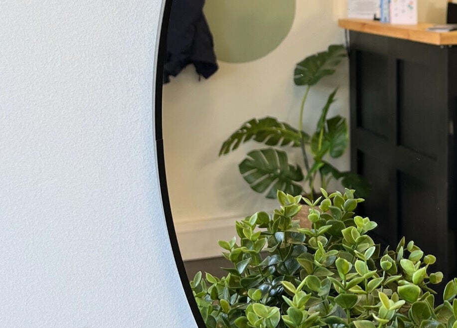 Stylish interior with plants at Charli's Hair Studio, Beccles, England, GB, reflecting a calm, welcoming atmosphere.