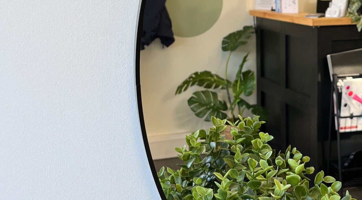 Stylish interior with plants at Charli's Hair Studio, Beccles, England, GB, reflecting a calm, welcoming atmosphere.
