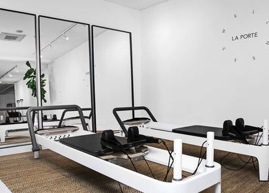Sleek Pilates reformer machines at La Porte Wellness, Rosebery, New South Wales, AU.