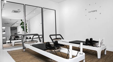 Sleek Pilates reformer machines at La Porte Wellness, Rosebery, New South Wales, AU.