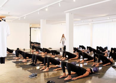 Pilates class at La Porte Wellness, Rosebery, New South Wales, AU with participants on mats.