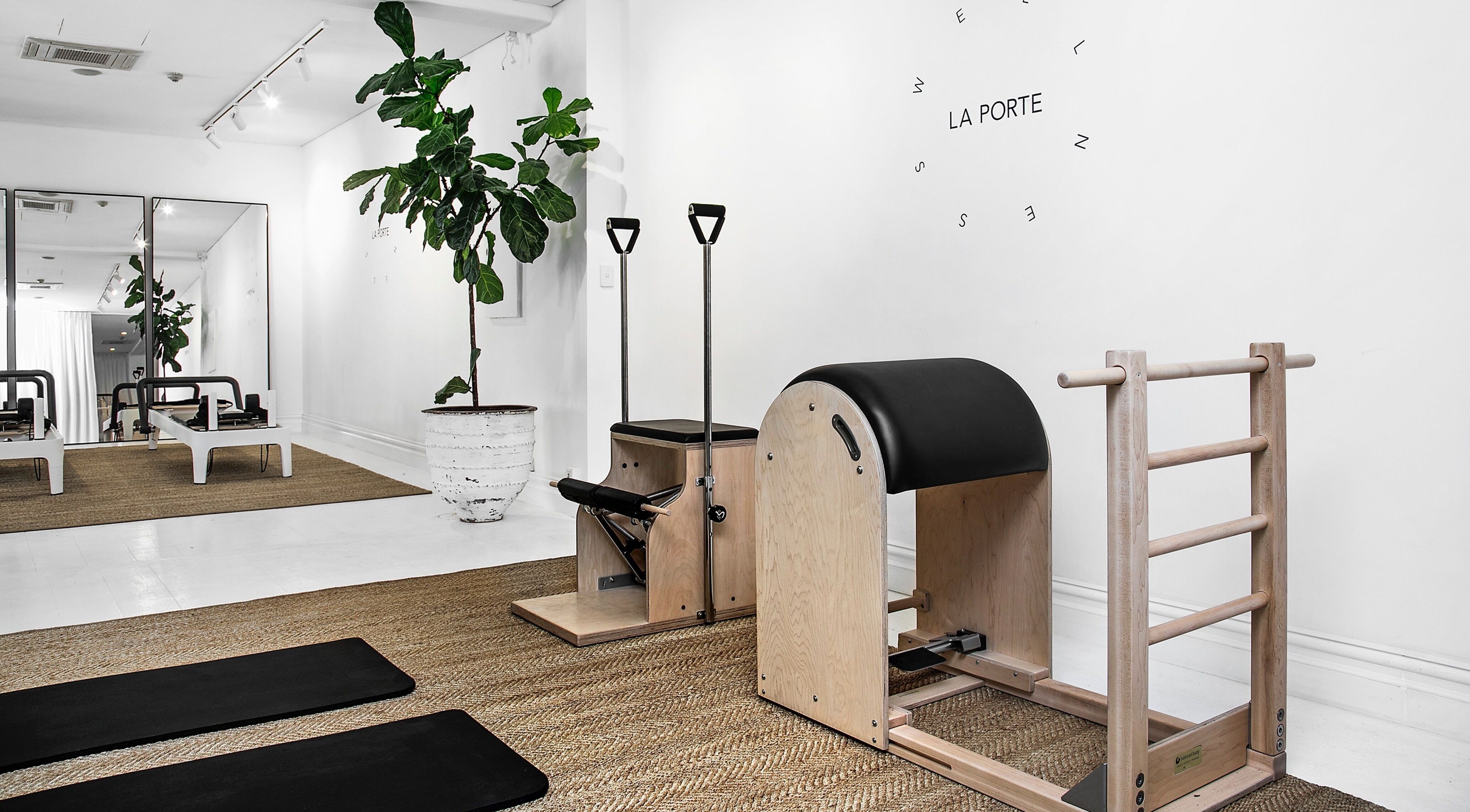 Elegant Pilates studio at La Porte Wellness, Rosebery, New South Wales, AU with modern equipment and serene atmosphere.