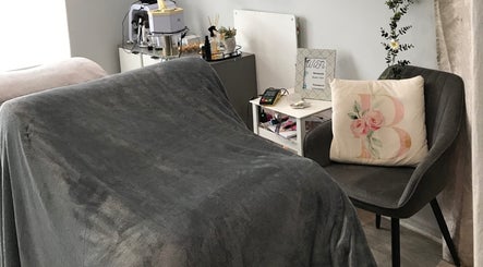 Cozy treatment room at Bali Rose Beauty Salon in Cape Town, Western Cape, ZA, with plush chair and essentials.