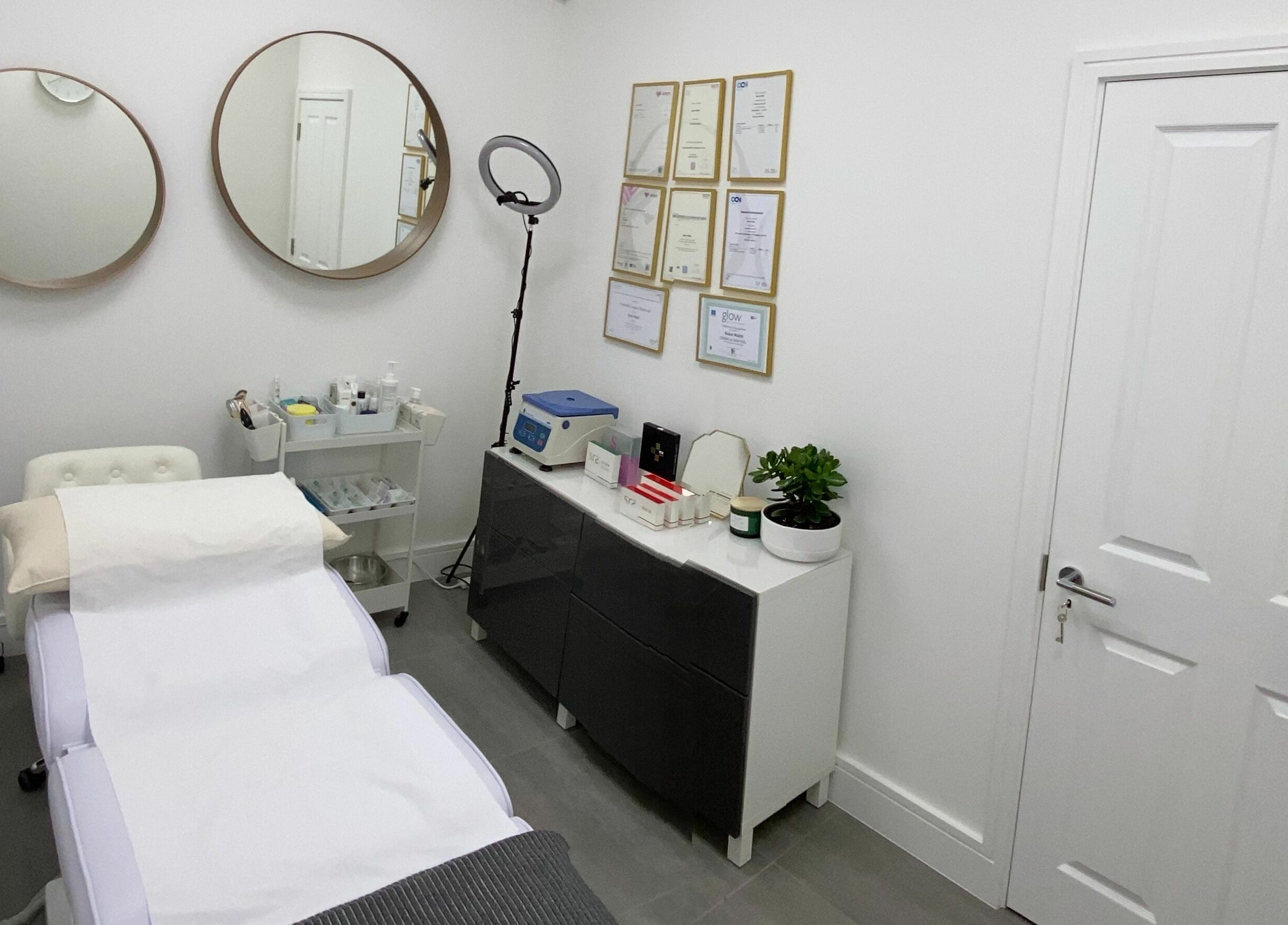 Treatment room at Beautybar Aesthetics in London, England, GB featuring modern decor and professional equipment.