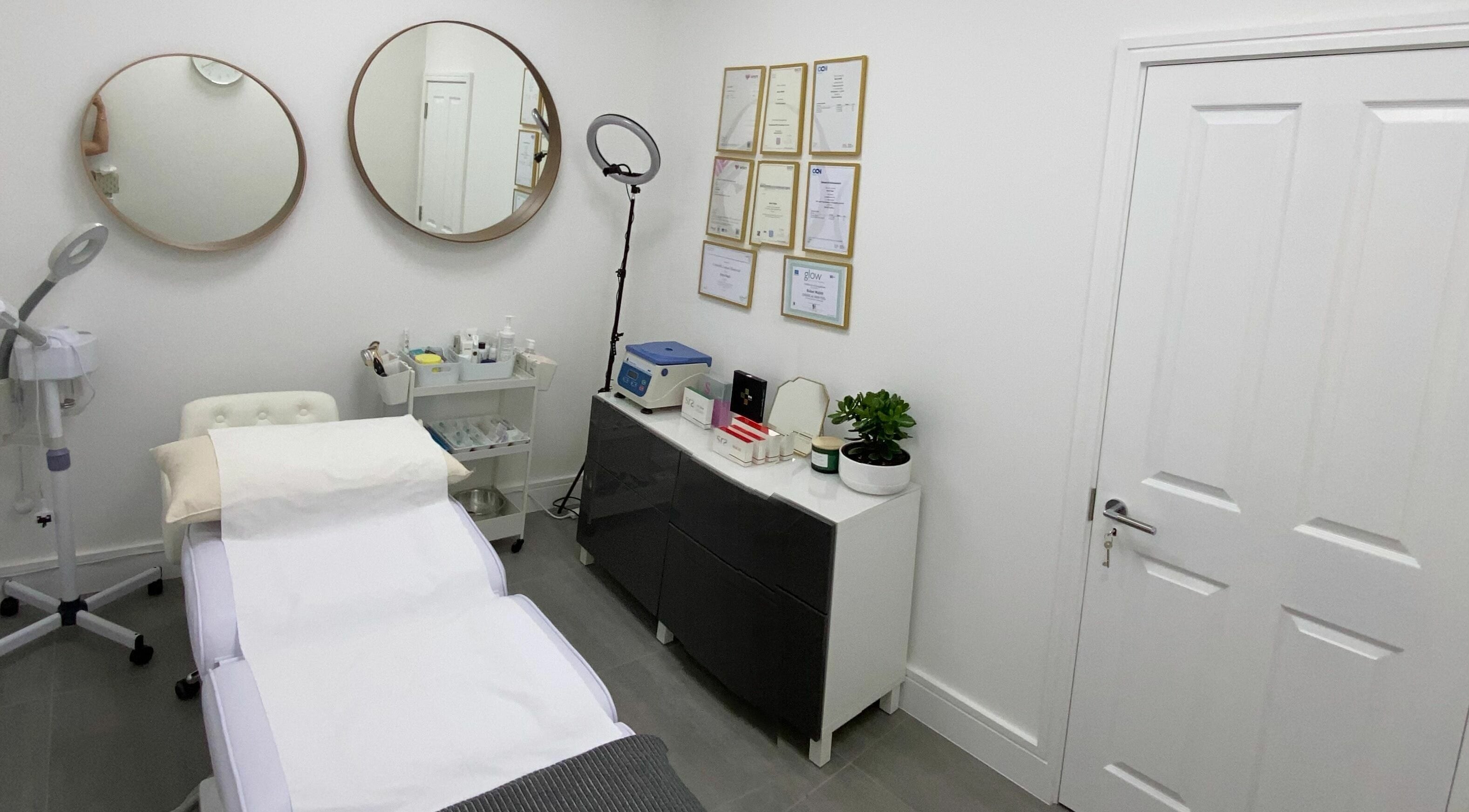 Treatment room at Beautybar Aesthetics in London, England, GB featuring modern decor and professional equipment.