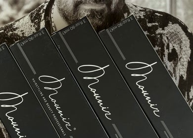 Mounir product boxes showcased at Claudia's Hair And Beauty in Grays, England, GB.