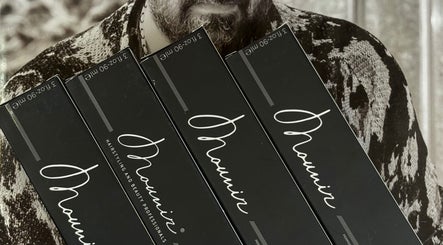 Mounir product boxes showcased at Claudia's Hair And Beauty in Grays, England, GB.