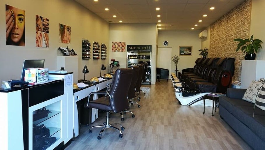 Bright interior of Rio Beauty in Napier, Hawke's Bay, NZ with stylish chairs and decor.