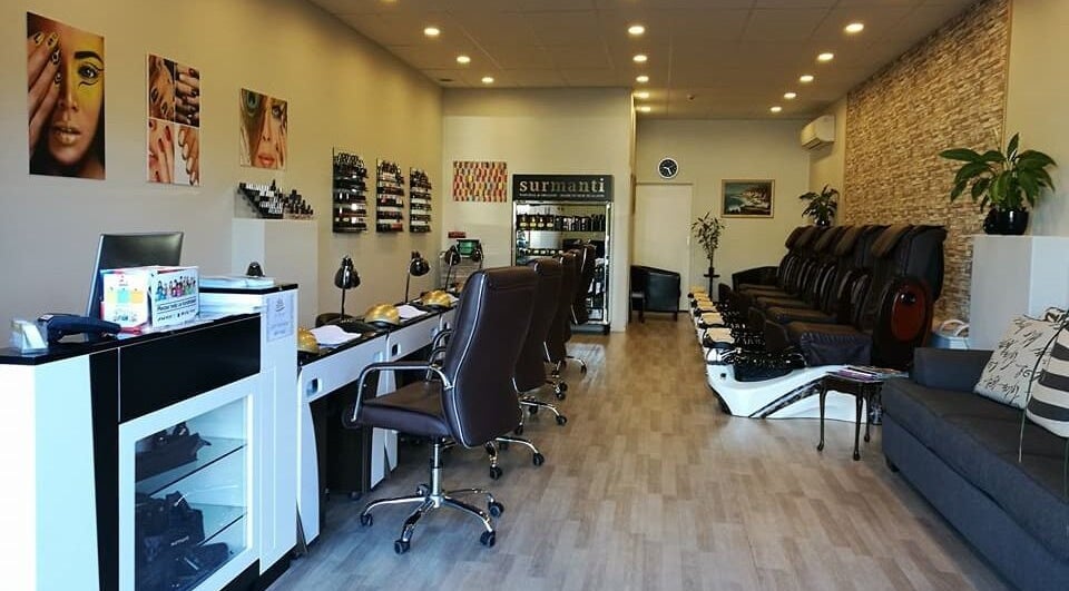 Bright interior of Rio Beauty in Napier, Hawke's Bay, NZ with stylish chairs and decor.